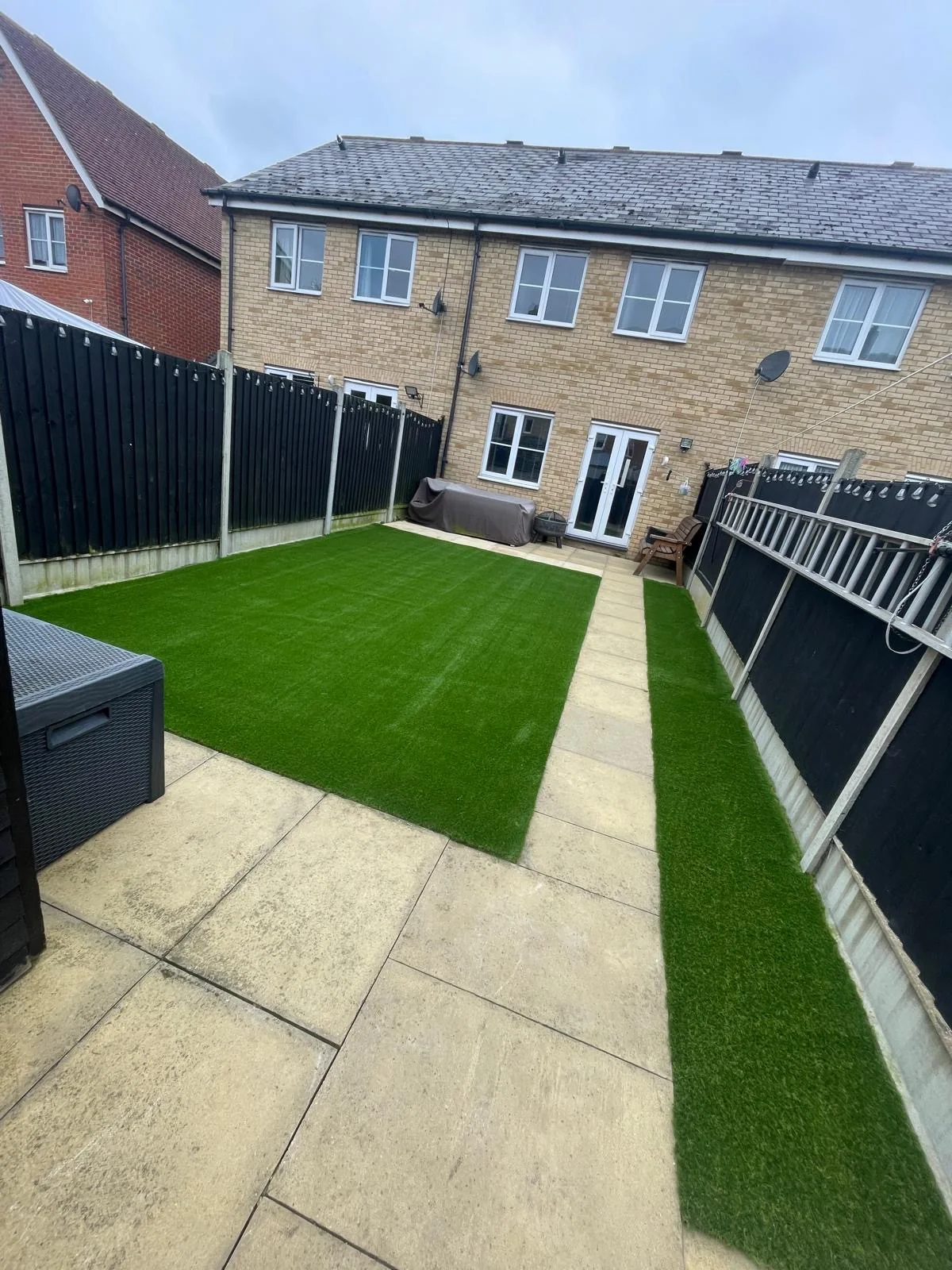Artificial lawn with paved path