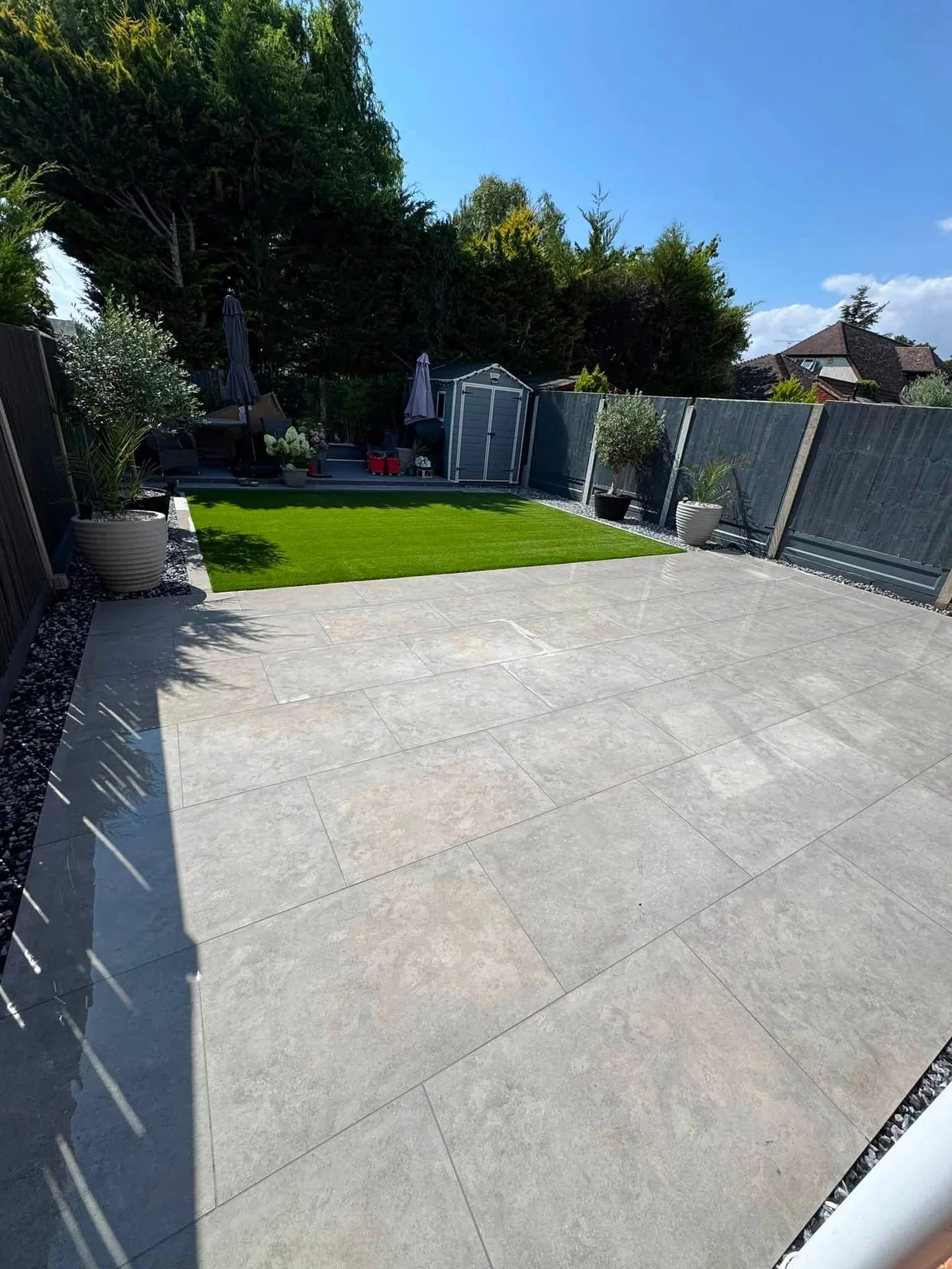 Paved garden area with lawn