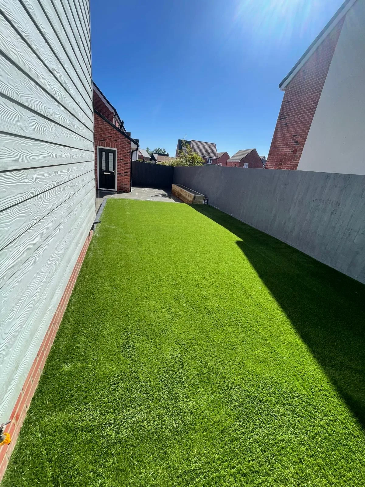 Garden with artificial lawn
